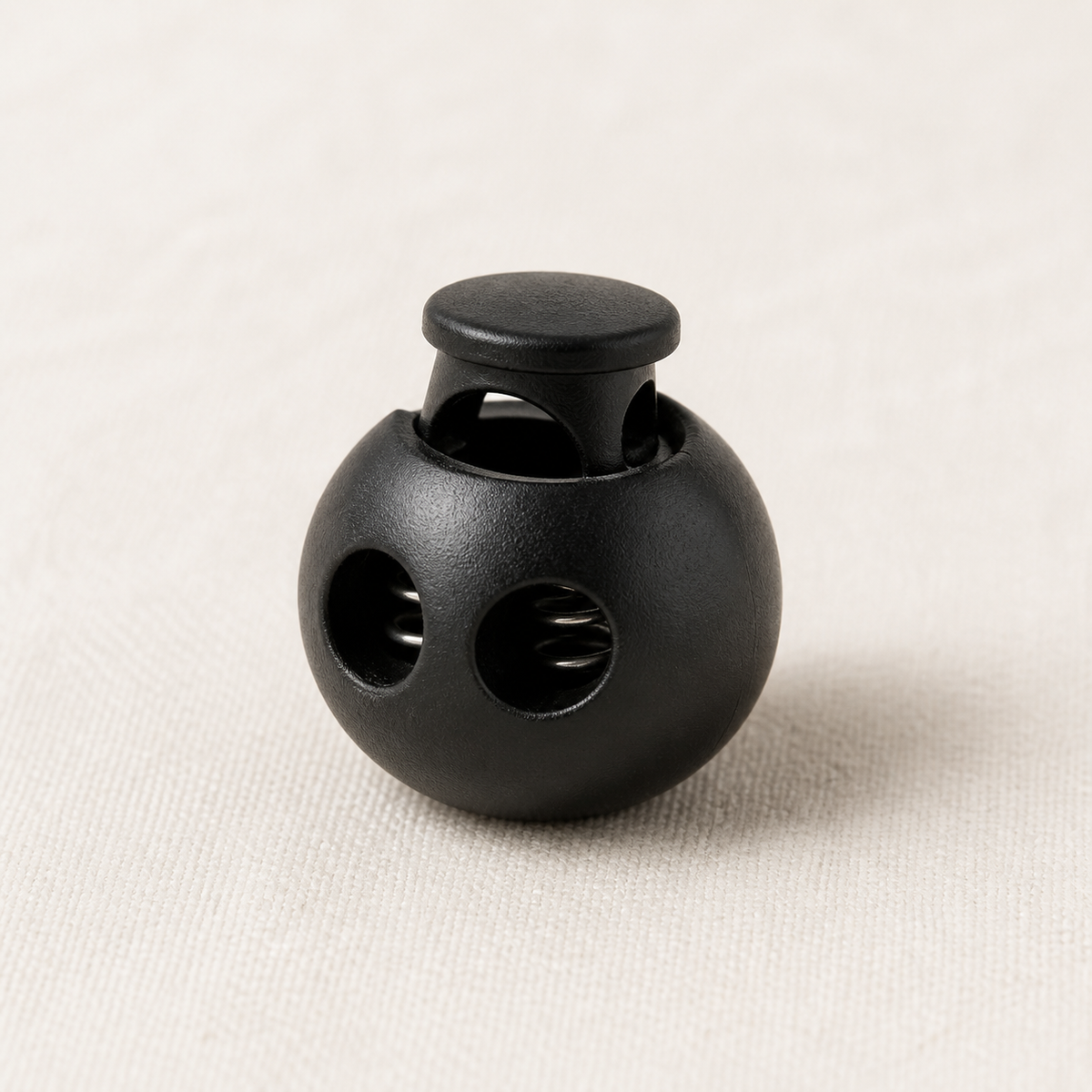 Bomb shaped black cord stopper
