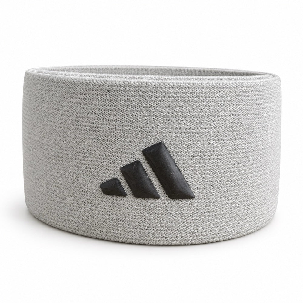 Light grey elastic with a dark grey silicone Adidas logo