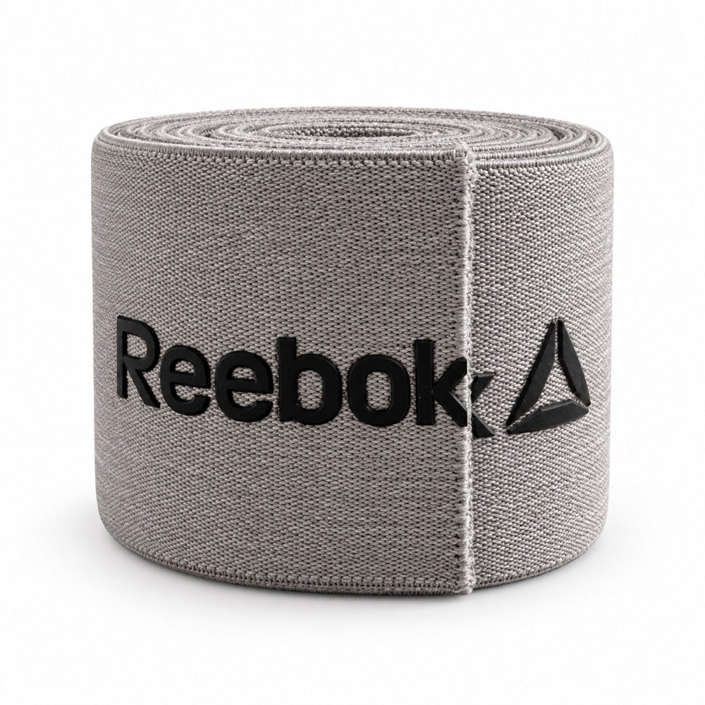 Grey elastic with a large raised black silicone Reebok logo